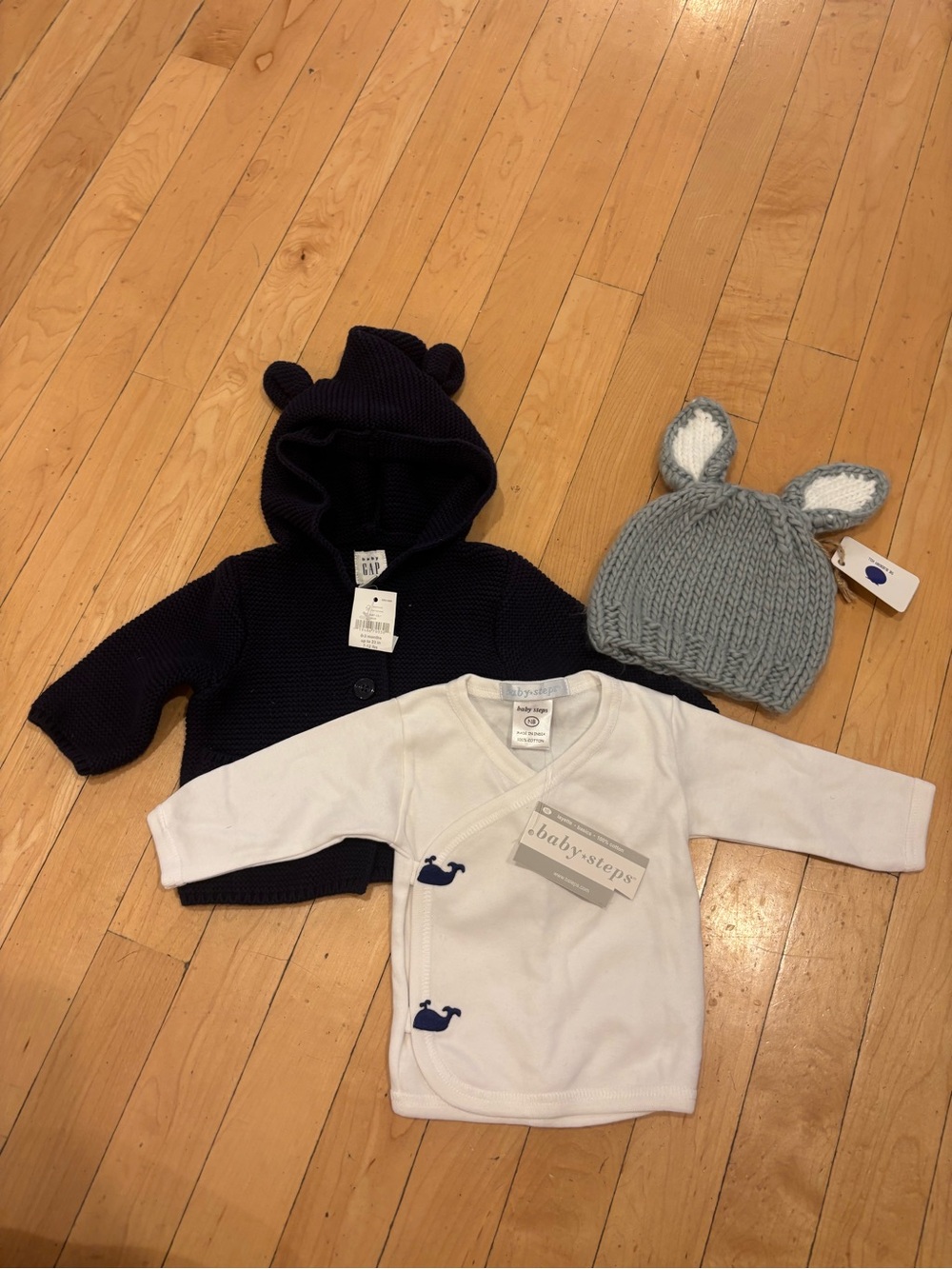 Set of new baby clothes size newborn to 3 months.